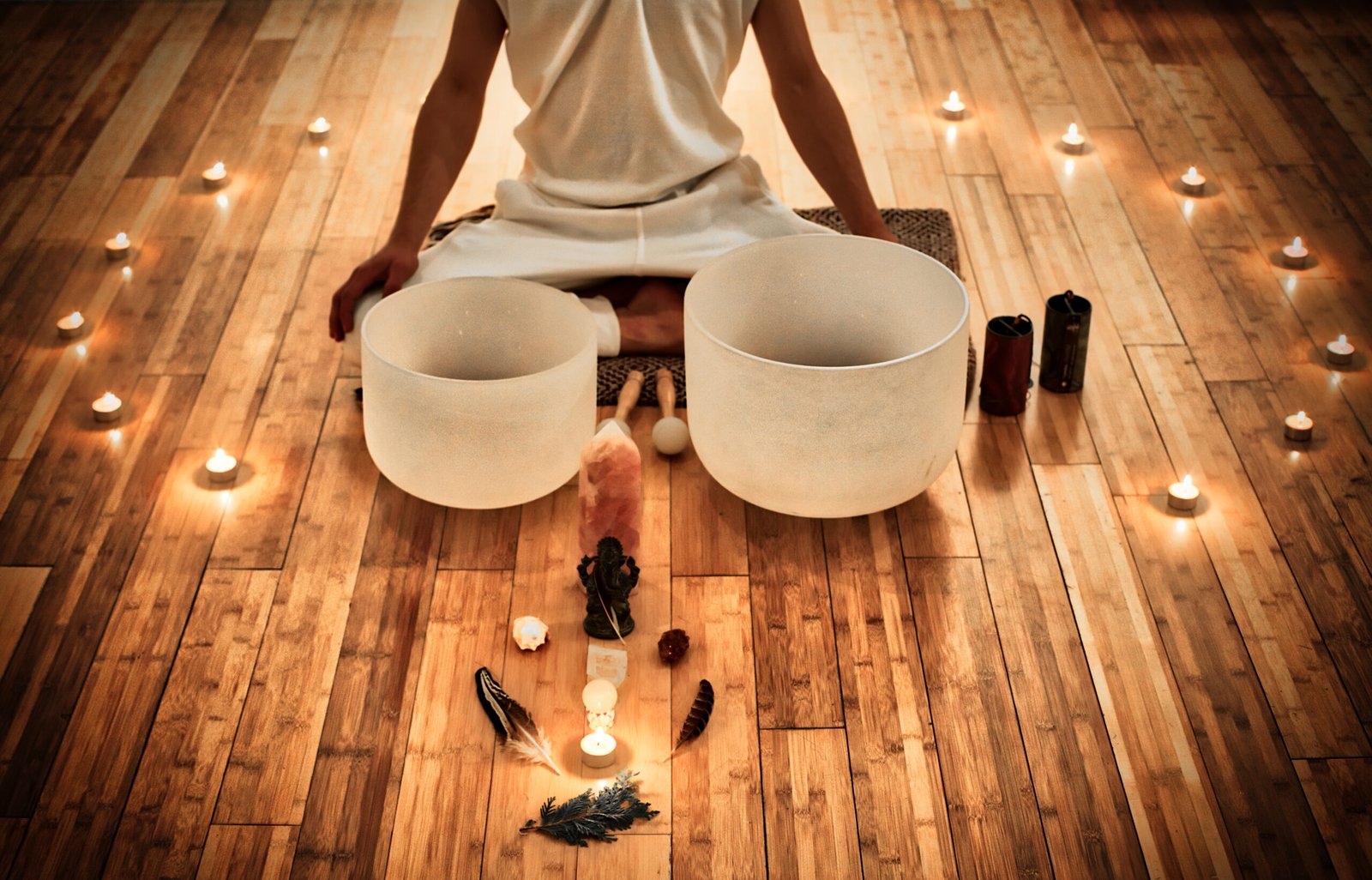man,sitting,in,indian,behind,his,two,musical,crystal,bowls,